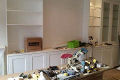 Work-in-progress build-in bespoke fully fitted wardrobe with bookshelves by Construction Bear
